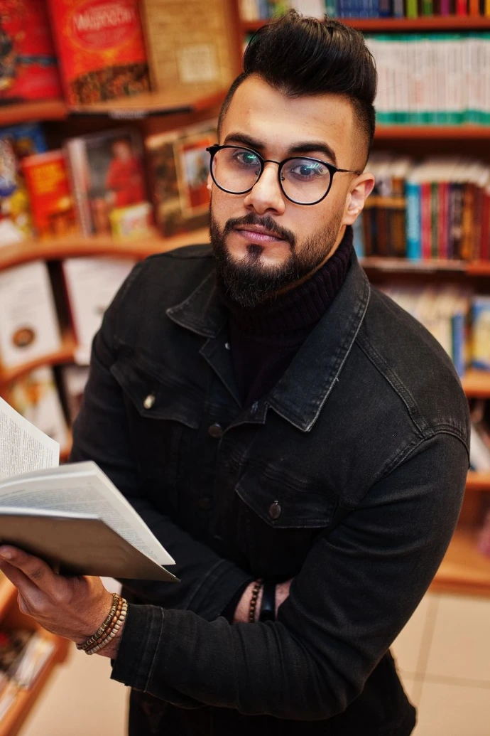 Arab student man at library