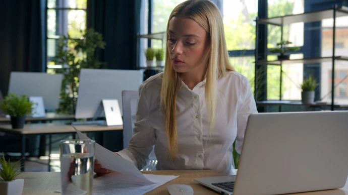 woman looking at contract